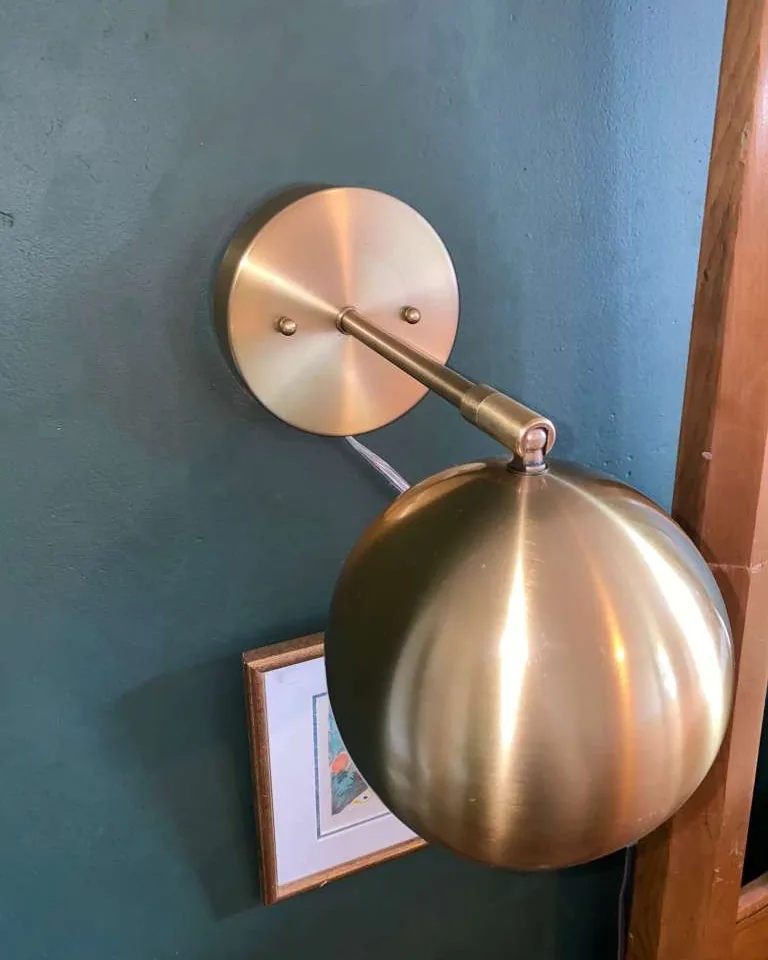 The same sconce polished.
